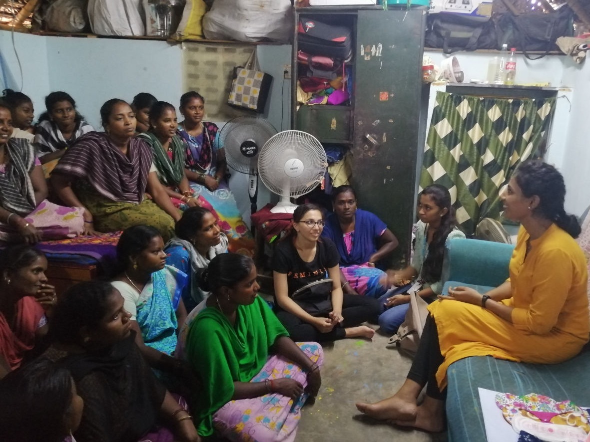 Meeting with the women of the workforce in a small room